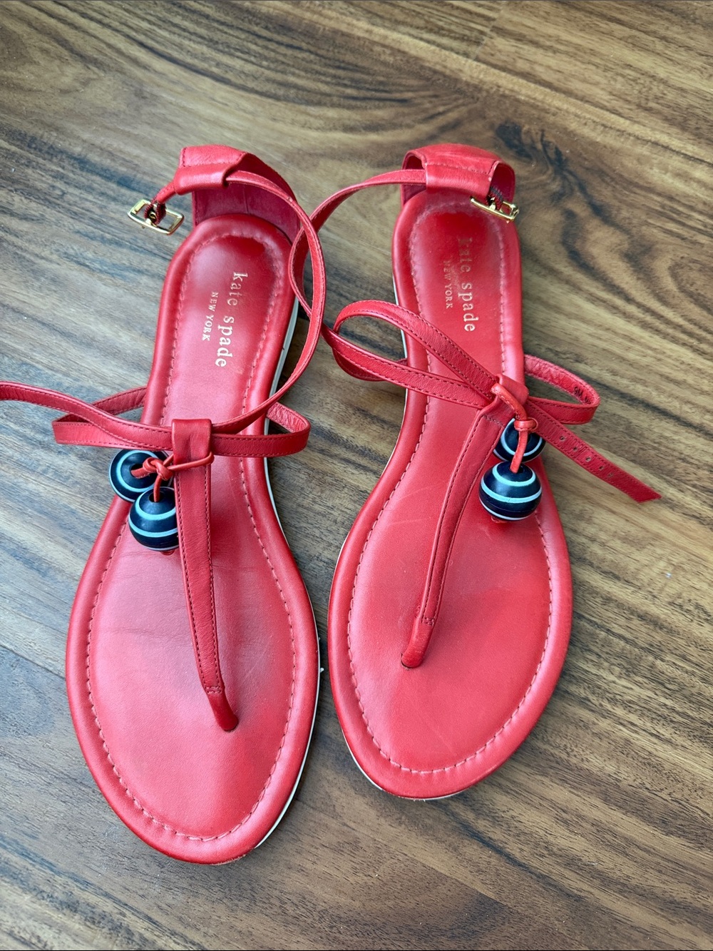 kate spade Red Leather T-Strap Sandals with Navy Accent Charms